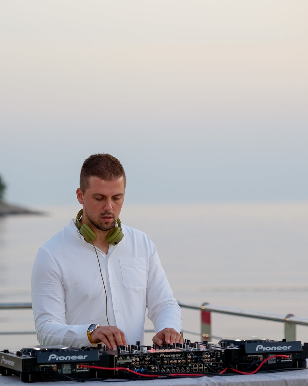 DJ Ivan Škrinjarić mixing music at a live event