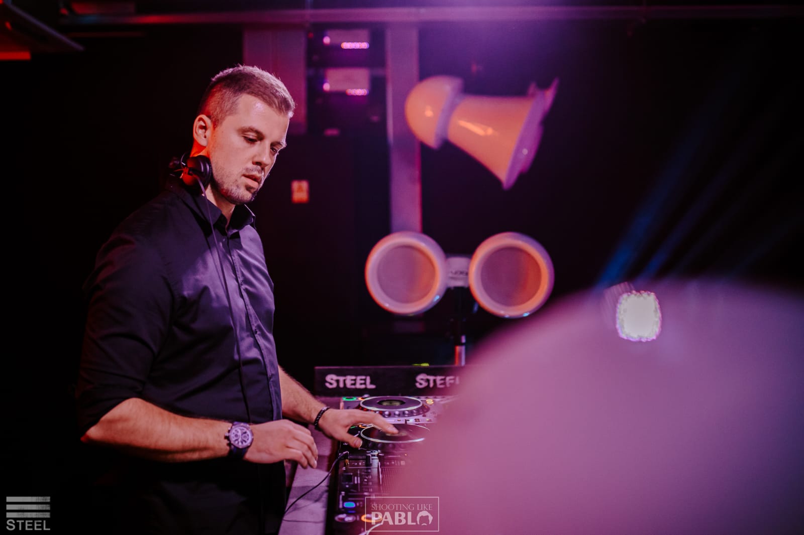 DJ Ivan Škrinjarić mixing music at a live event