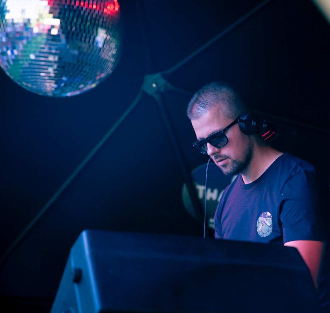 DJ Ivan Škrinjarić mixing music at a live event